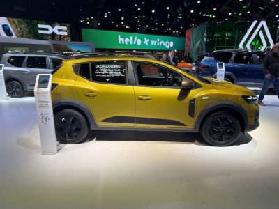 Side profile of compact crossover with rugged cladding and black alloy wheels