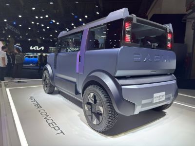 Rear view of futuristic SUV with angular design and rugged tires