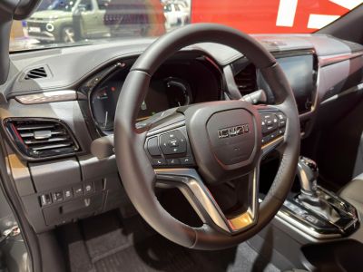 Steering wheel and dashboard controls of a modern vehicle interior