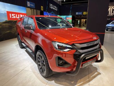 Red pickup front with LED headlights and bull bar