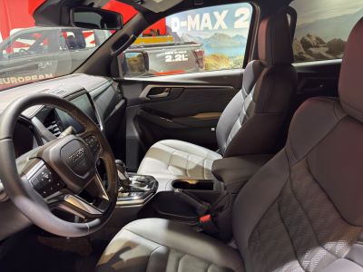 Modern vehicle interior with leather seats and central dashboard