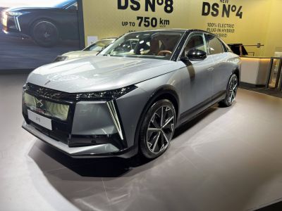 Futuristic front grille with sharp LED headlights and aerodynamic sleek body