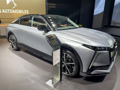 Front-side view of an electric SUV with LED headlights and sleek aerodynamic styling
