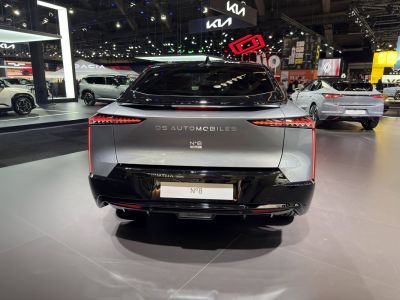 Angular rear tail lights and sleek badge on modern vehicle