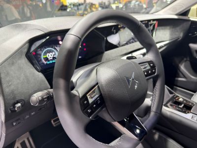 Luxury steering wheel and digital dashboard in modern vehicle interior