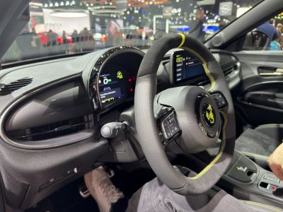 Digital dashboard and sport steering wheel with yellow stitching