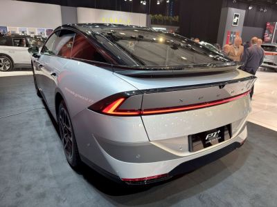 Rear view with continuous tail light bar and integrated spoiler