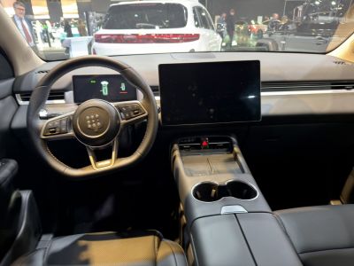 Digital instrument cluster and large central touchscreen display.
