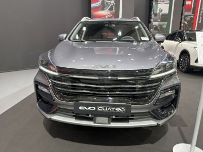 Front view of SUV with LED headlights and bold grille.