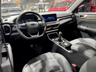 Digital dashboard and manual gearbox in modern car interior