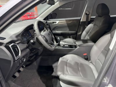 Modern car interior with leather seats and digital dashboard