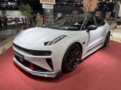 Updated front design and LED headlights on a white electric vehicle