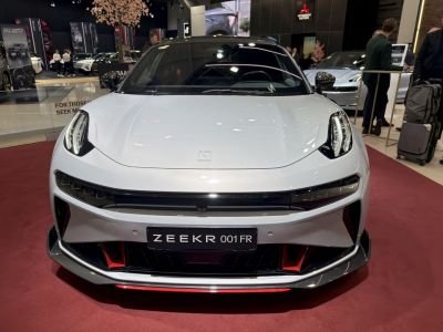 Front view with updated headlights and aggressive splitter