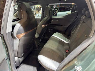 Spacious modern rear passenger seats with premium materials.