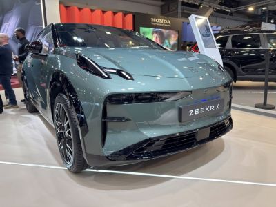 Sleek car front end with distinctive headlights and aerodynamic styling