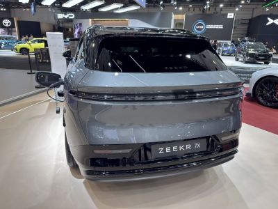 Rear view of electric SUV with integrated charging port and sleek taillights