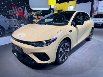 Front view of sleek car with LED headlights and aerodynamic styling