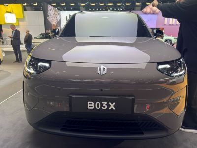 Front view of an electric SUV with sleek hood and LED headlights