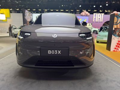 Front view with LED headlights and aerodynamic bumper of electric compact SUV