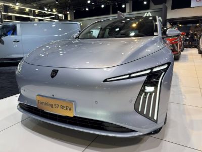 Sleek front fascia with unique vertical LED headlights and smooth hood.