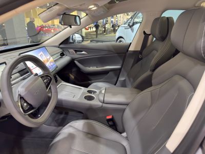 Modern interior with digital dashboard and ergonomic leather seats