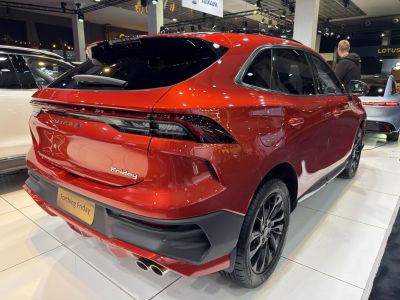 Rear view of sporty SUV with dual exhaust and sleek tail lights