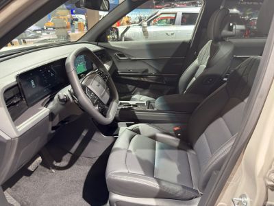 Digital dashboard and leather seats in a modern car interior