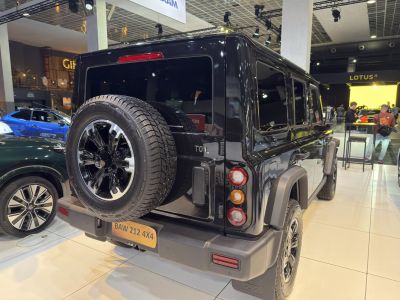 SUV rear with spare tire on tailgate and distinct rear lights