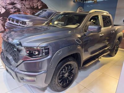 Aggressive front grille and rugged all-terrain wheels