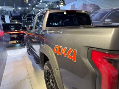 4x4 pickup rear side with bold decal and rugged details