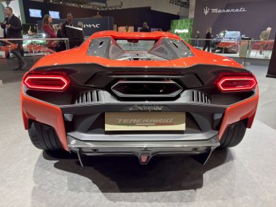 Rear view with aggressive tail lights and central exhaust