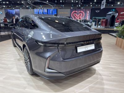 Rear view with continuous LED tail lights and sleek aerodynamic design