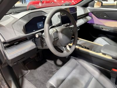 Digital instrument cluster and touchscreen center console in luxury car interior