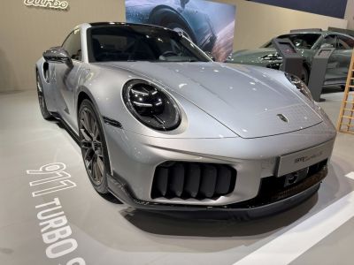 Front close-up of Porsche 911 with LED headlights and large air intakes