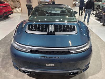 Rear view with engine vents and taillight strip