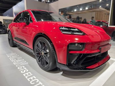Sporty electric SUV with LED headlights and black alloy wheels.