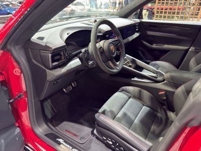 Modern electric SUV interior with digital cockpit and sports steering wheel