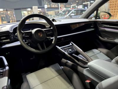Modern dashboard and steering wheel inside a luxury electric SUV
