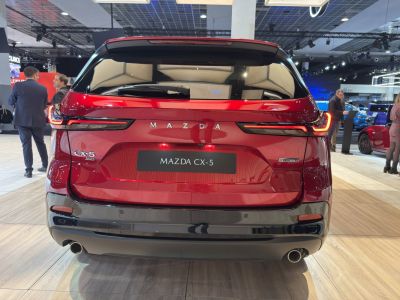 Rear view with LED taillights and dual exhaust in red finish