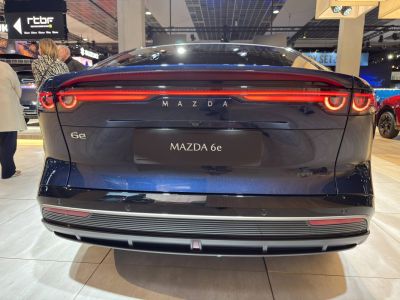 Rear view with distinctive LED tail lights and sleek bumper design