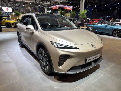 Futuristic LED headlights and aerodynamic front design of an electric SUV