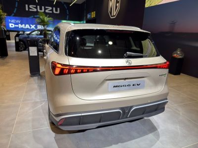 Rear view and LED tail lights of modern electric SUV