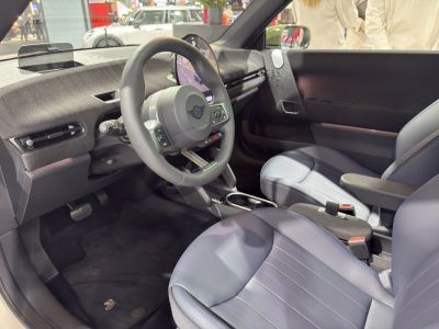 Steering wheel and digital dashboard with modern compact interior design