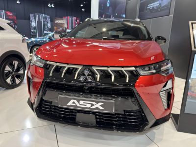 Bold front grille and sleek LED headlights of a modern SUV