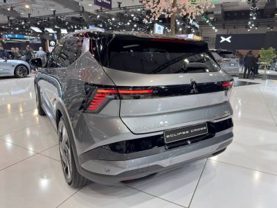 Rear view of a sleek electric SUV with distinctive taillight design