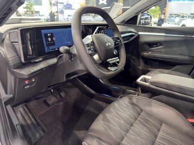 Electric vehicle interior with digital dashboard and multifunction steering wheel