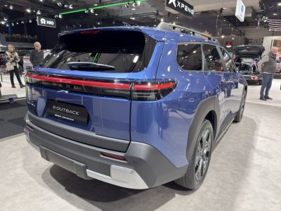 Rear view of SUV with continuous tail light bar and rugged rear bumper