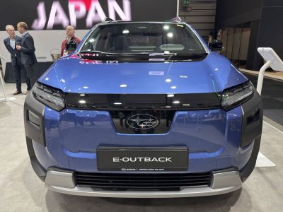 Sleek front design of an electric SUV with modern grille and LED headlights