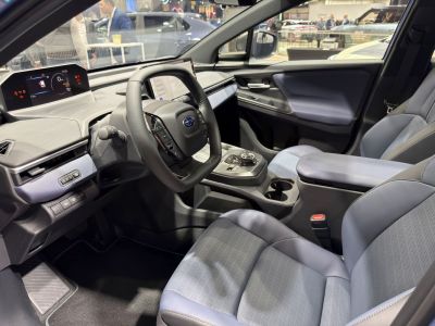 Digital dashboard, modern steering wheel controls, ergonomic front seats