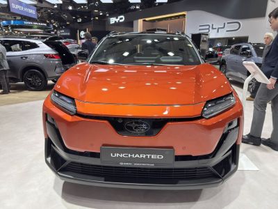 Front view with sleek headlights and bold grille of an electric SUV.